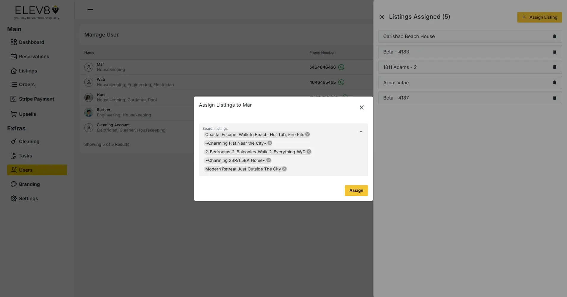 ELEV8 platform screenshot showing user management and listing assignment interface.